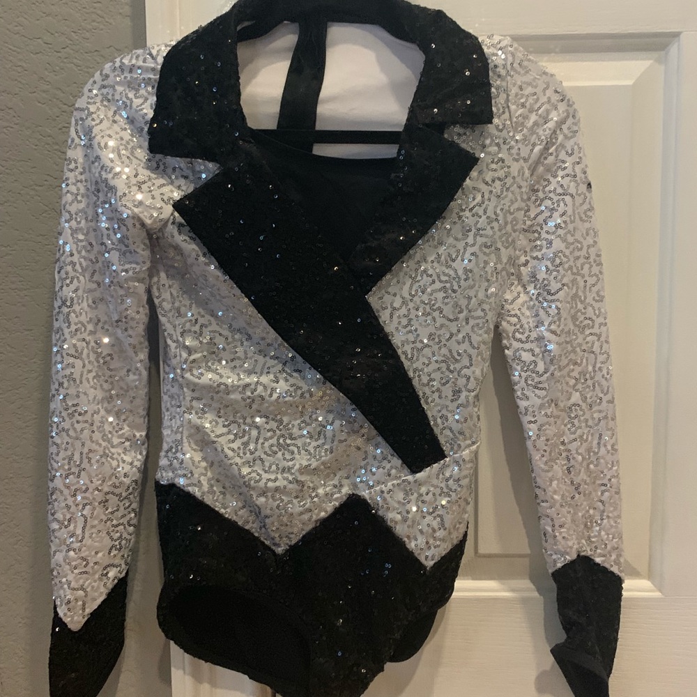 A silver and black costume